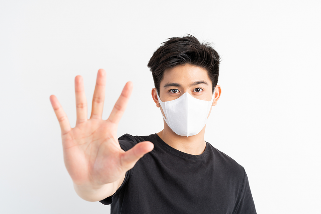 Stop civid-19 , asian man wearing face mask